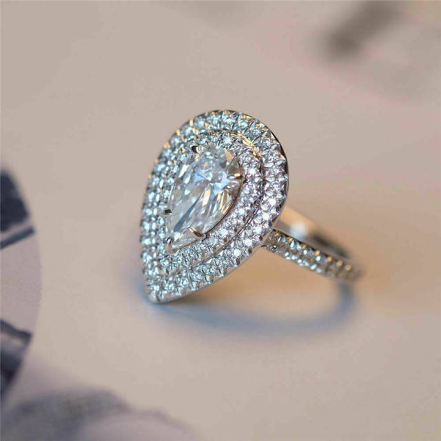 Pear cut diamond wedding rings