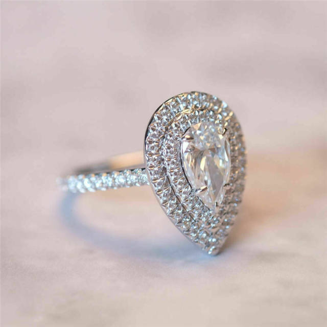 Pear cut diamond wedding rings
