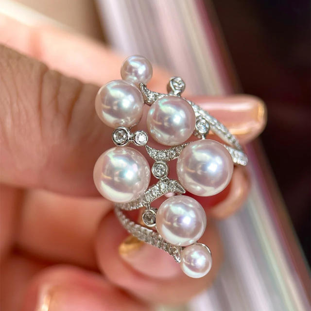 Elegant pearl statement ins openning rings