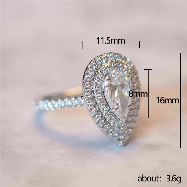 Pear cut diamond wedding rings