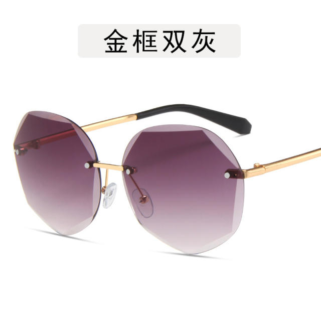 Round shape crystal edge rimless sunglasses