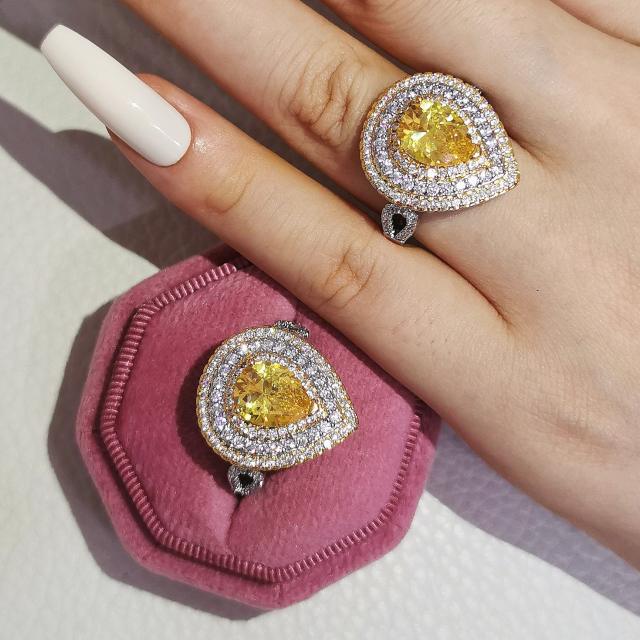 Luxury yellow color pear cut cubic zircon wedding rings