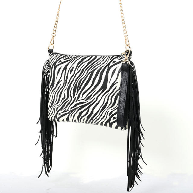 Zebra pattern tassel clutch