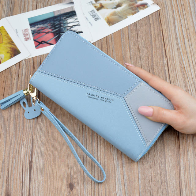 Fashion new color matching tassel purse