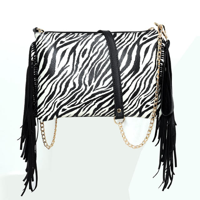 Zebra pattern tassel clutch