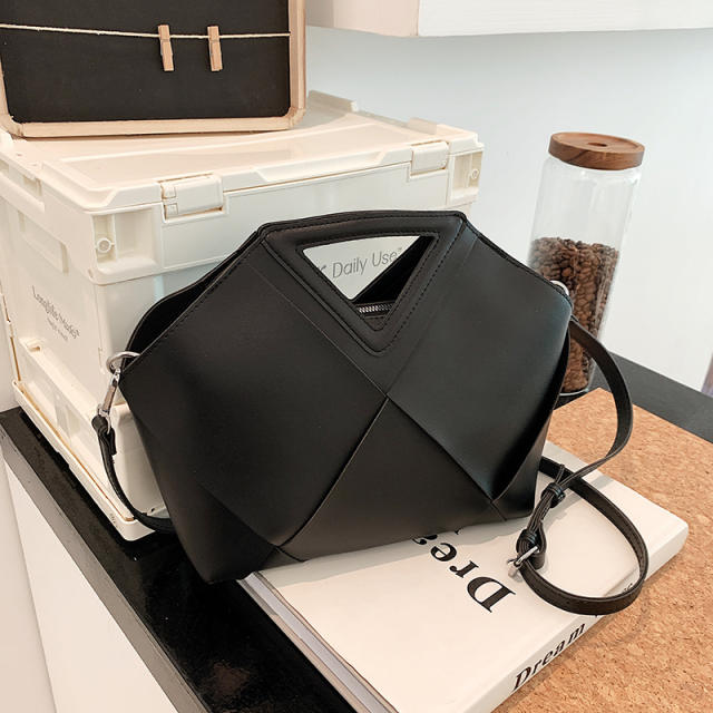 Elegant triangle handle unique handbag