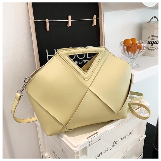 Elegant triangle handle unique handbag