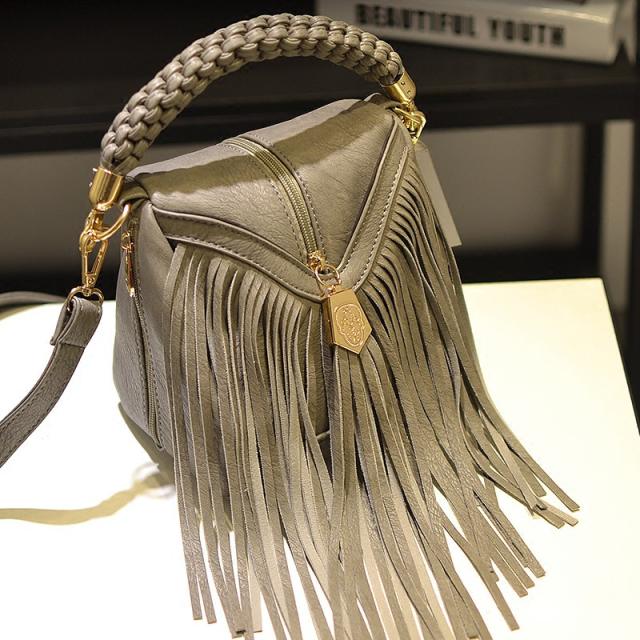 Braided handle tassel handbag