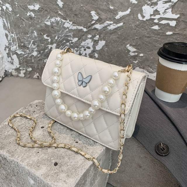 Vintage pearl handle crossbody bag