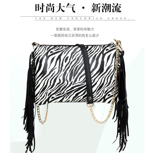 Vintage tassel leopard clutch