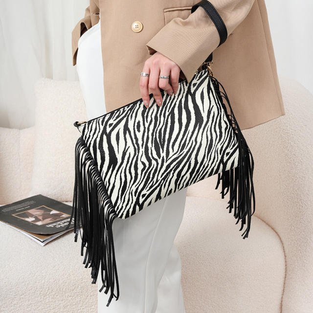 Zebra pattern tassel clutch