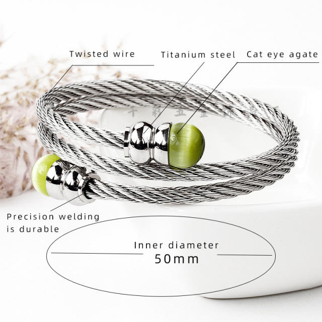 Colored crystal twisted wire stainless steel bangle