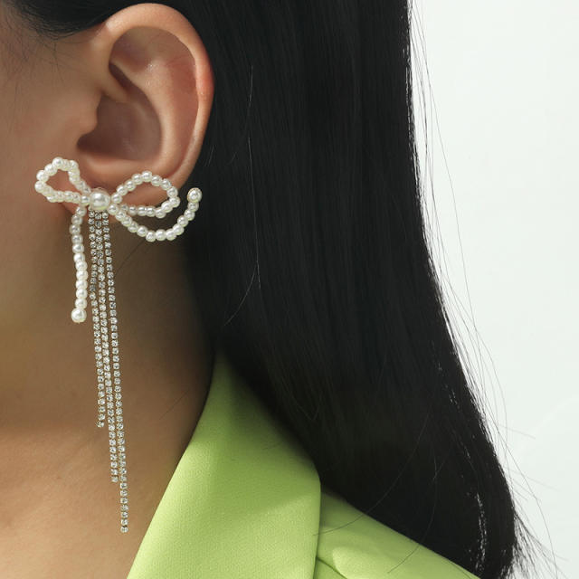 Pearl bow rhinestone tassel earrings