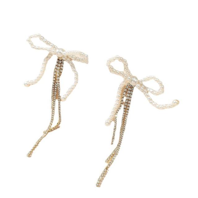 Pearl bow rhinestone tassel earrings