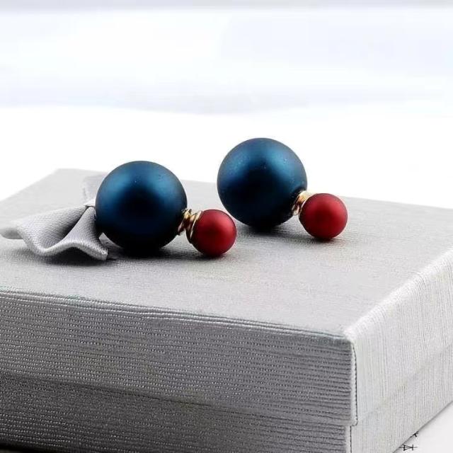 Big imitation pearl stud earrings