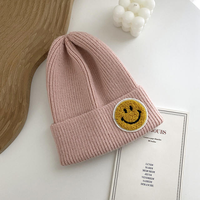 Smilely face knitted beanie cap