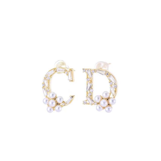 Korean style CD letter Pearl asymmetric stud earrings