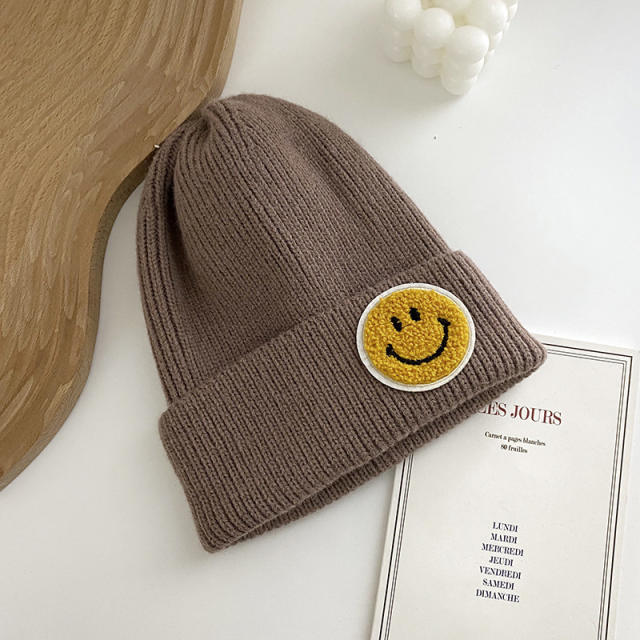 Smilely face knitted beanie cap