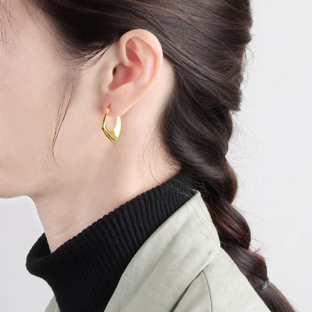 Irregular copper huggie earrings