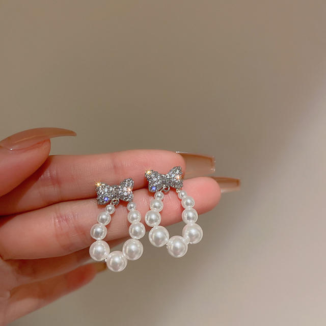 Cubic zircon bow pearl drop earrings