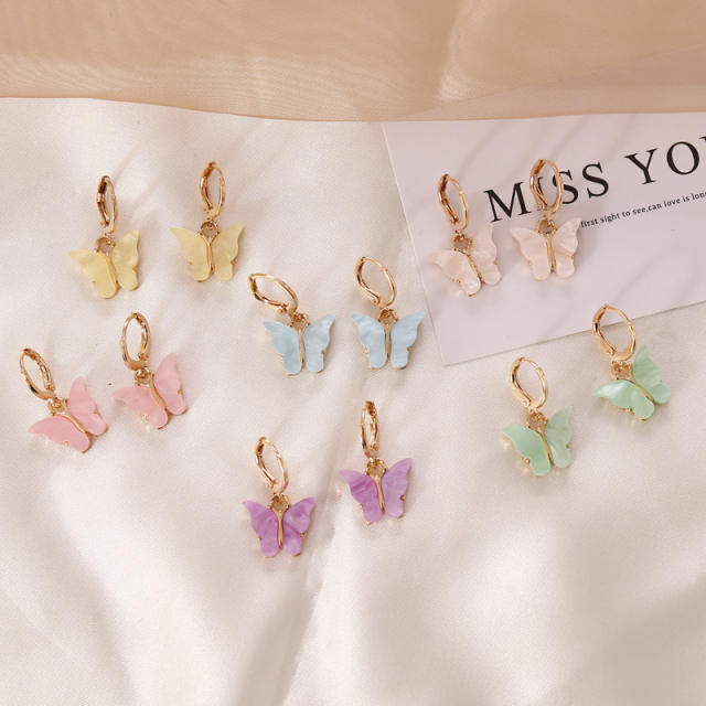 Color butterfly huggie earrings