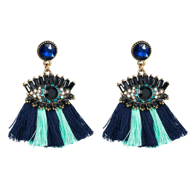 Evil's eye tassel earrings