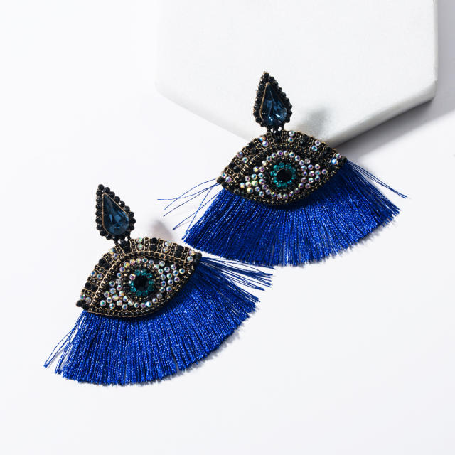 Evil's eye fan-shaped tassel earrings