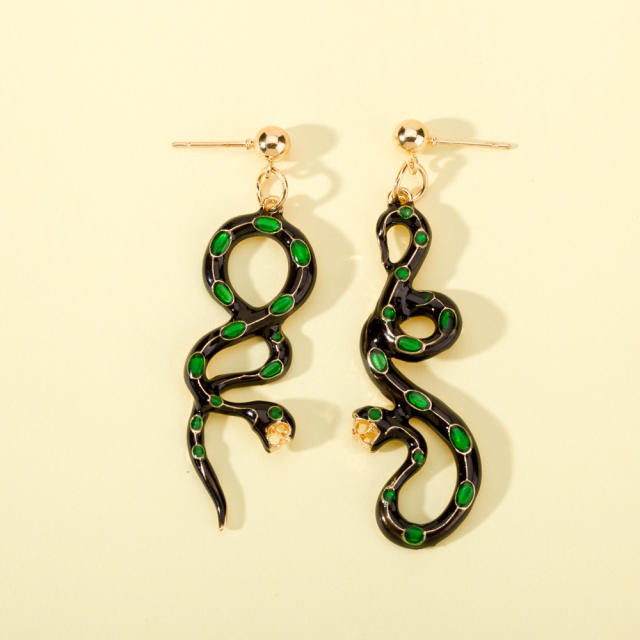Asymmetric snake pendant earrings