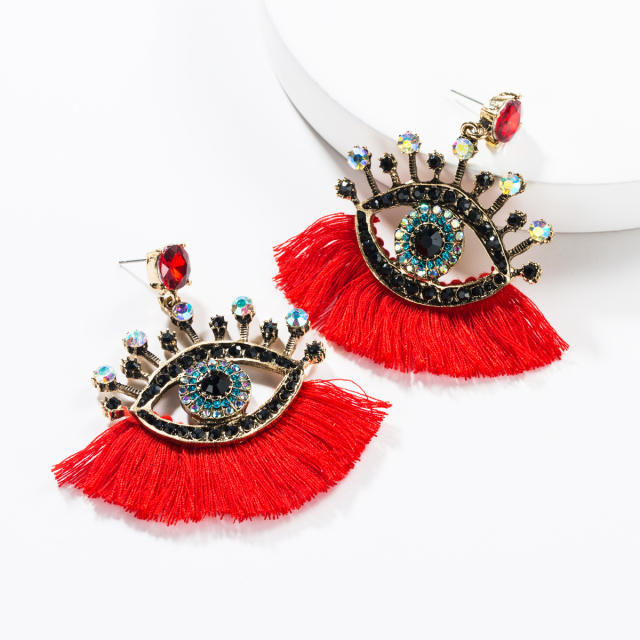 Evil's eye tassel earrings