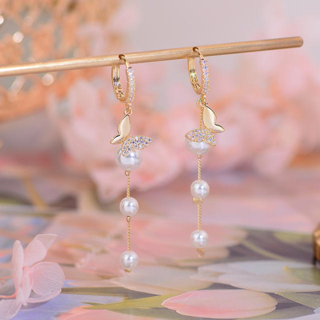 Diamond butterfly pearl tassel huggie earrings