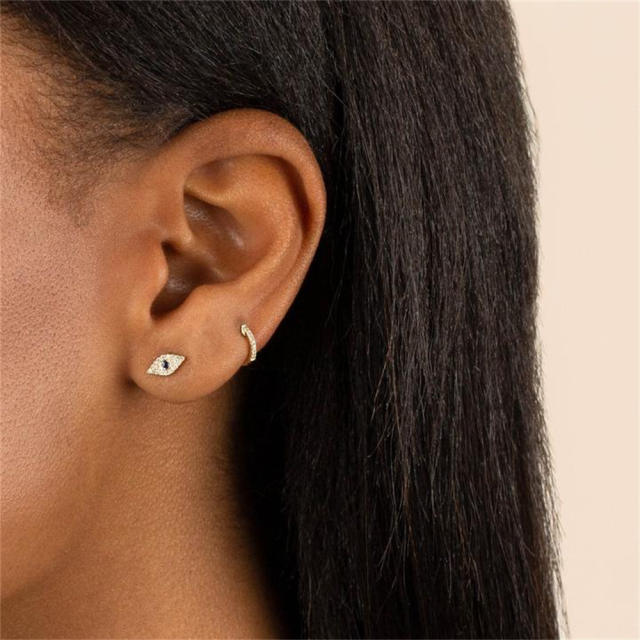 Diamone evil eye huggie earrings