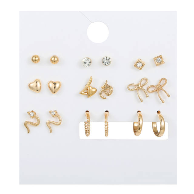 9 pair gold color snake ear studs set