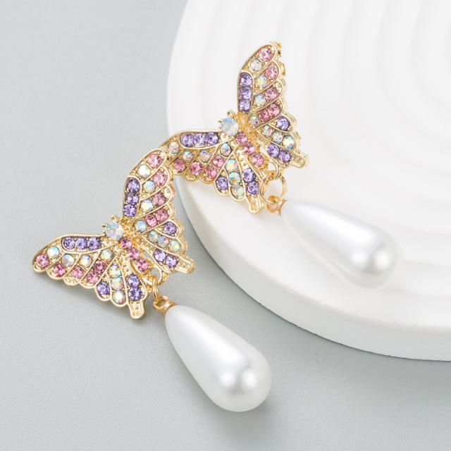 Diamond butterfly pearl drop earrings