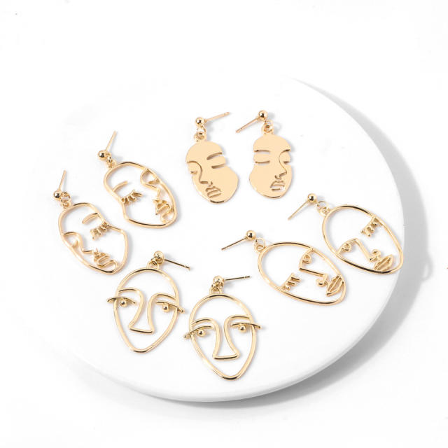 Face pendant earrings