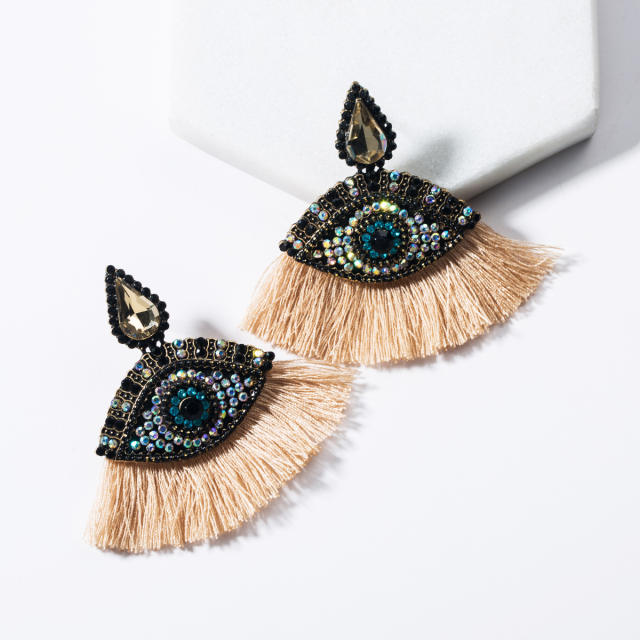 Evil's eye fan-shaped tassel earrings