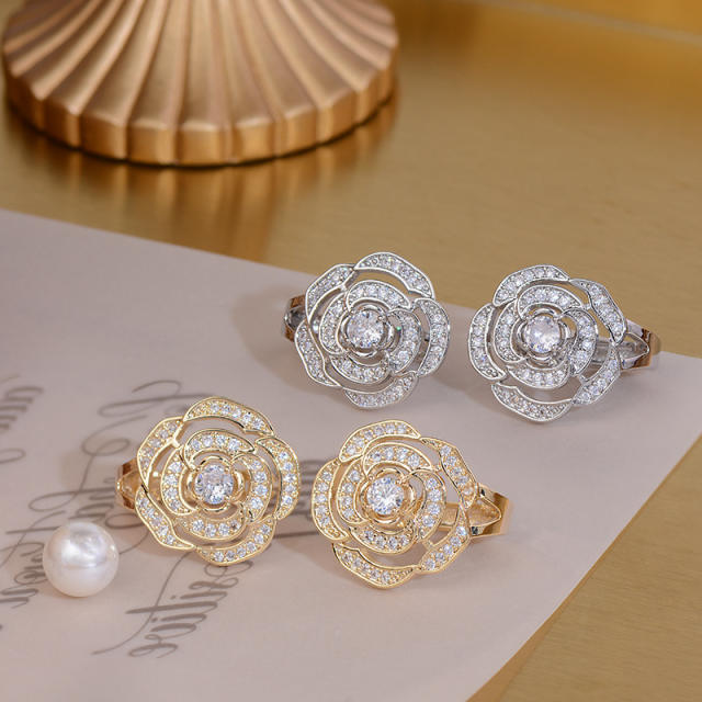 Hollow camellia diamond huggie earrings