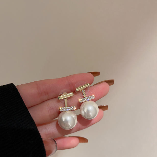 Diamond T pearl jacket earrings
