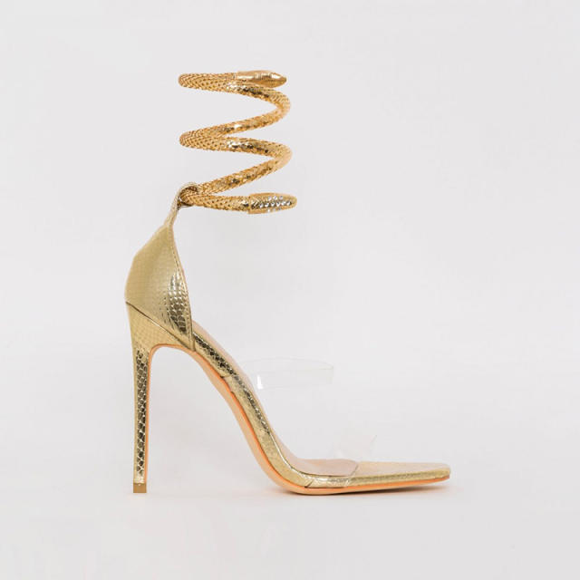Unique gold color snake design strappy clear heeled sandals