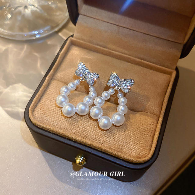 Cubic zircon bow pearl drop earrings