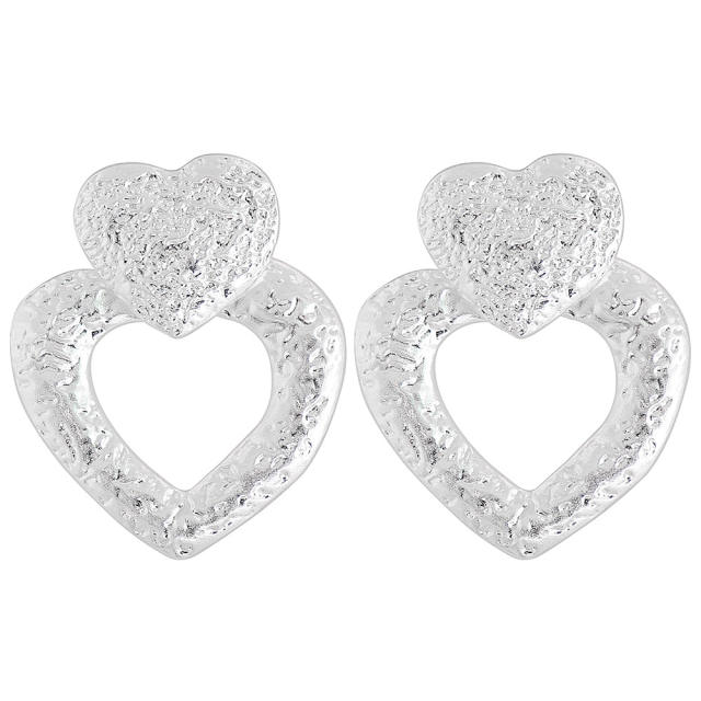 Exaggerated metal heart earrings