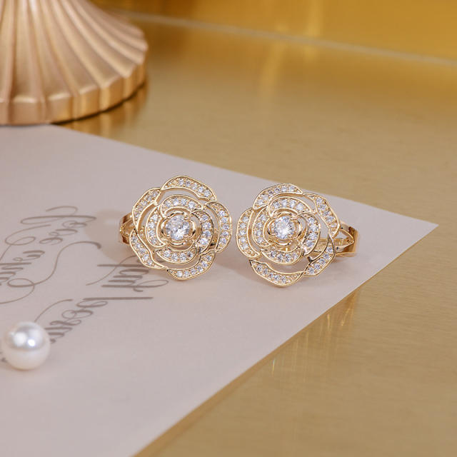 Hollow camellia diamond huggie earrings