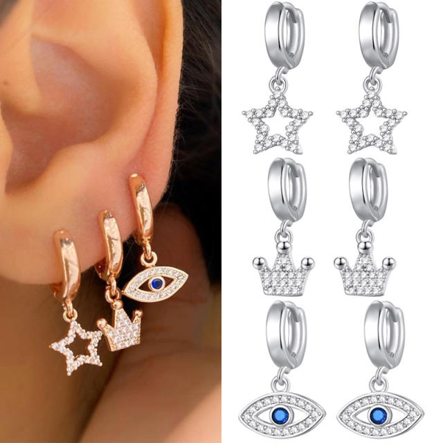 Rhinestone crown evil eye star huggie earrings