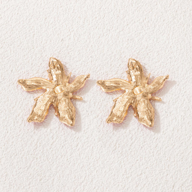 Exaggerated enamel flower ear studs