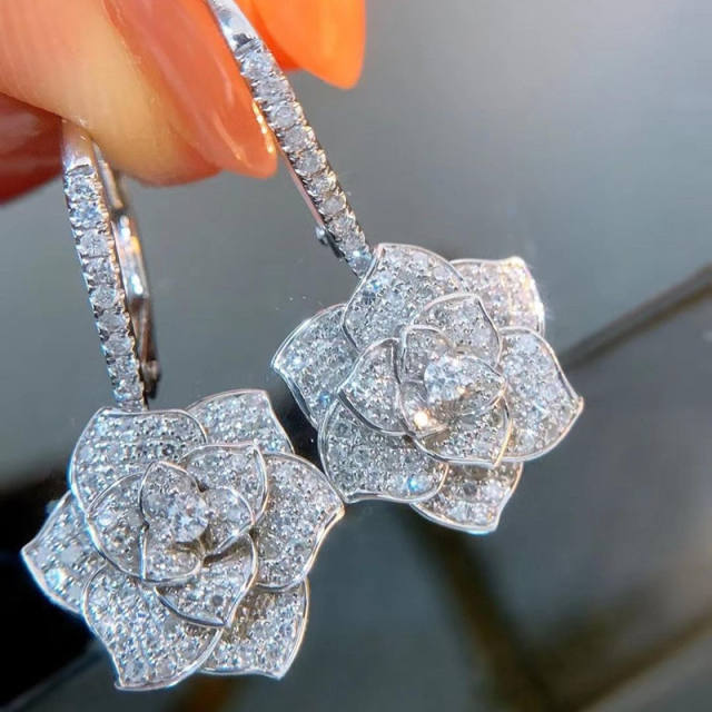 Pave setting camellia huggie earrings