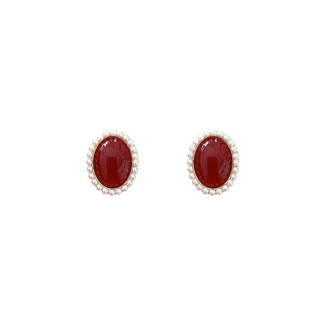Oval shape pearl beaded clip on earrings