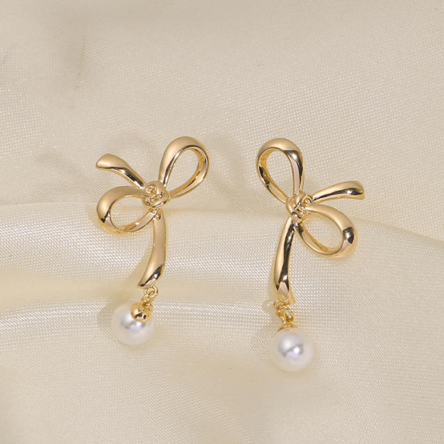 Hollow bow pearl bead clip on earrings drop earrings