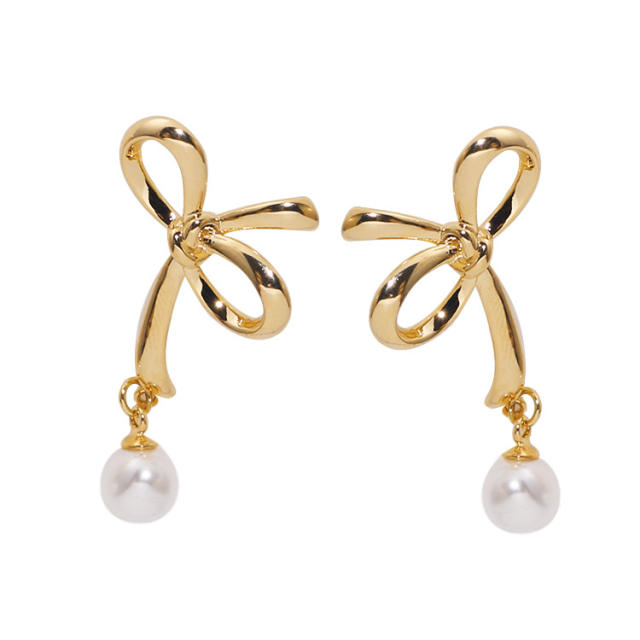 Hollow bow pearl bead clip on earrings drop earrings