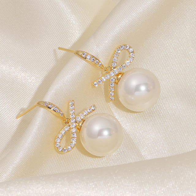 Diamond bow pearl clip on earrings drop earrings