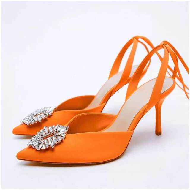 Orange strappy high heels