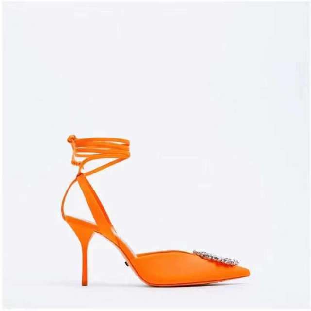 Orange strappy high heels